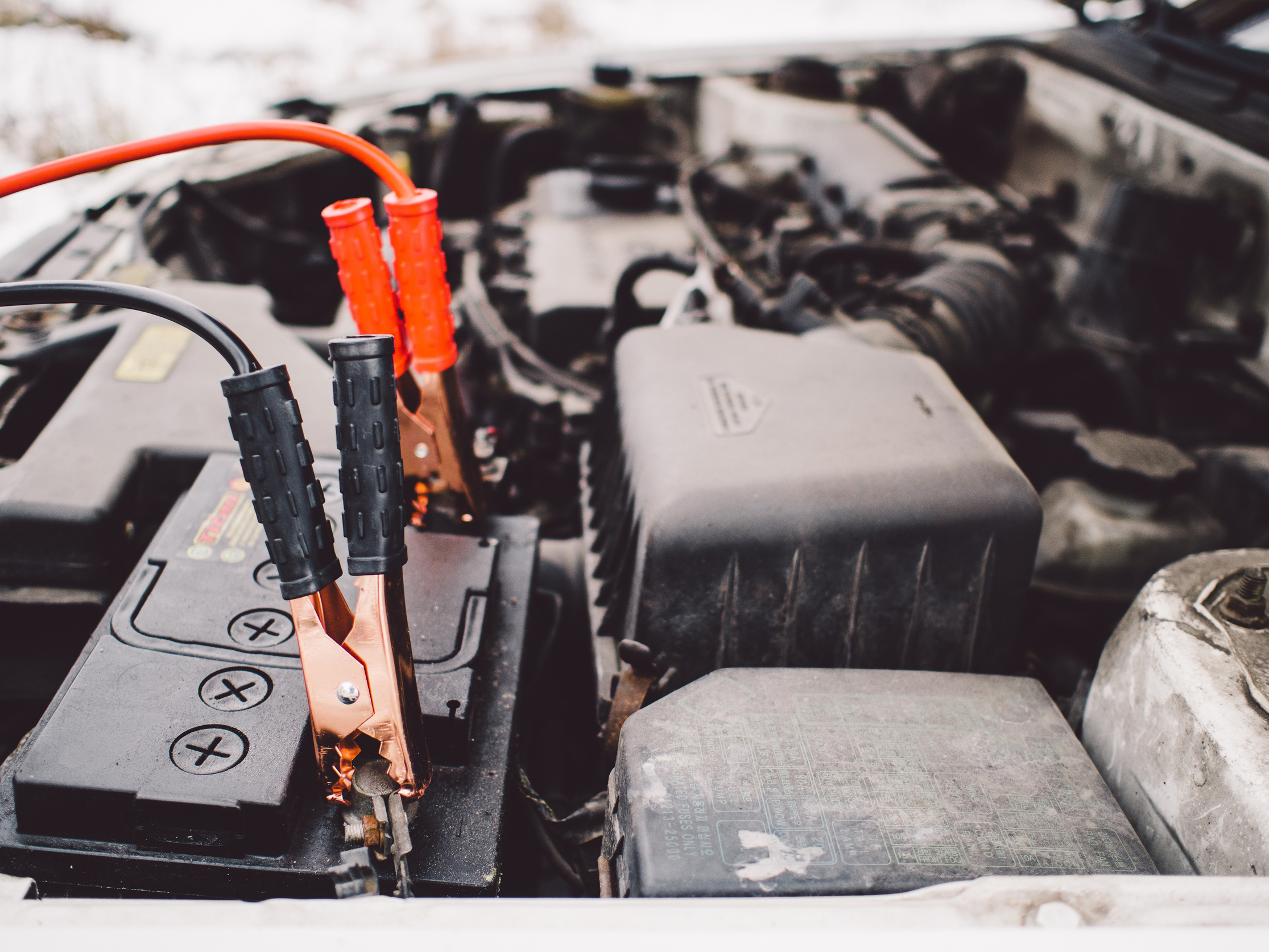 Jumper Cables on a Car Engine